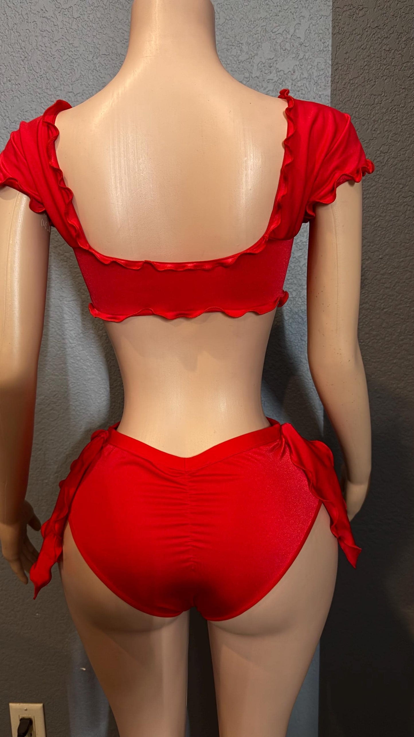 Red ruffle rave set with cheeky bottoms and attached side ties