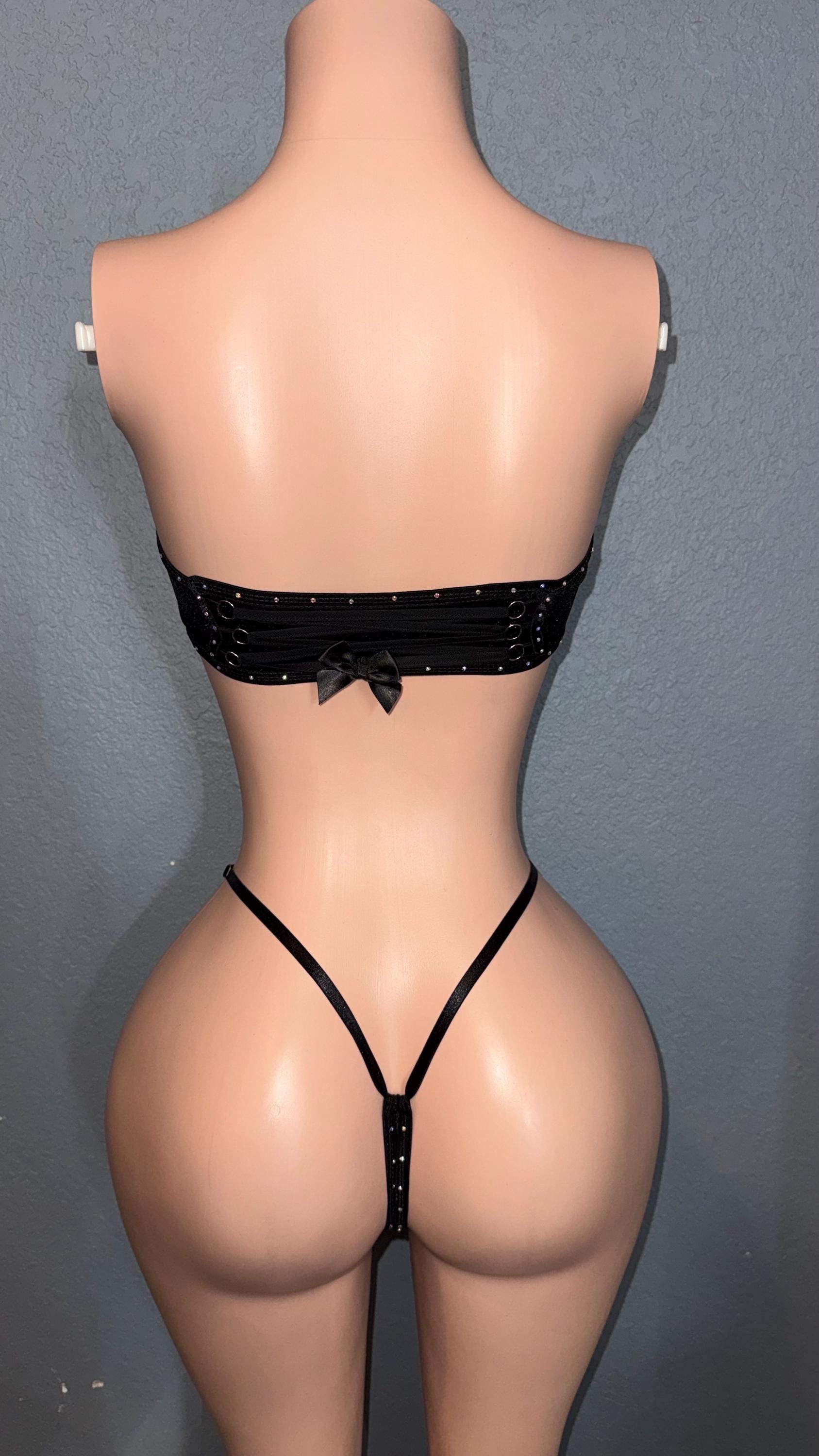 Black stretch velvet sparkly thong bikini. Adjustable with side ties.