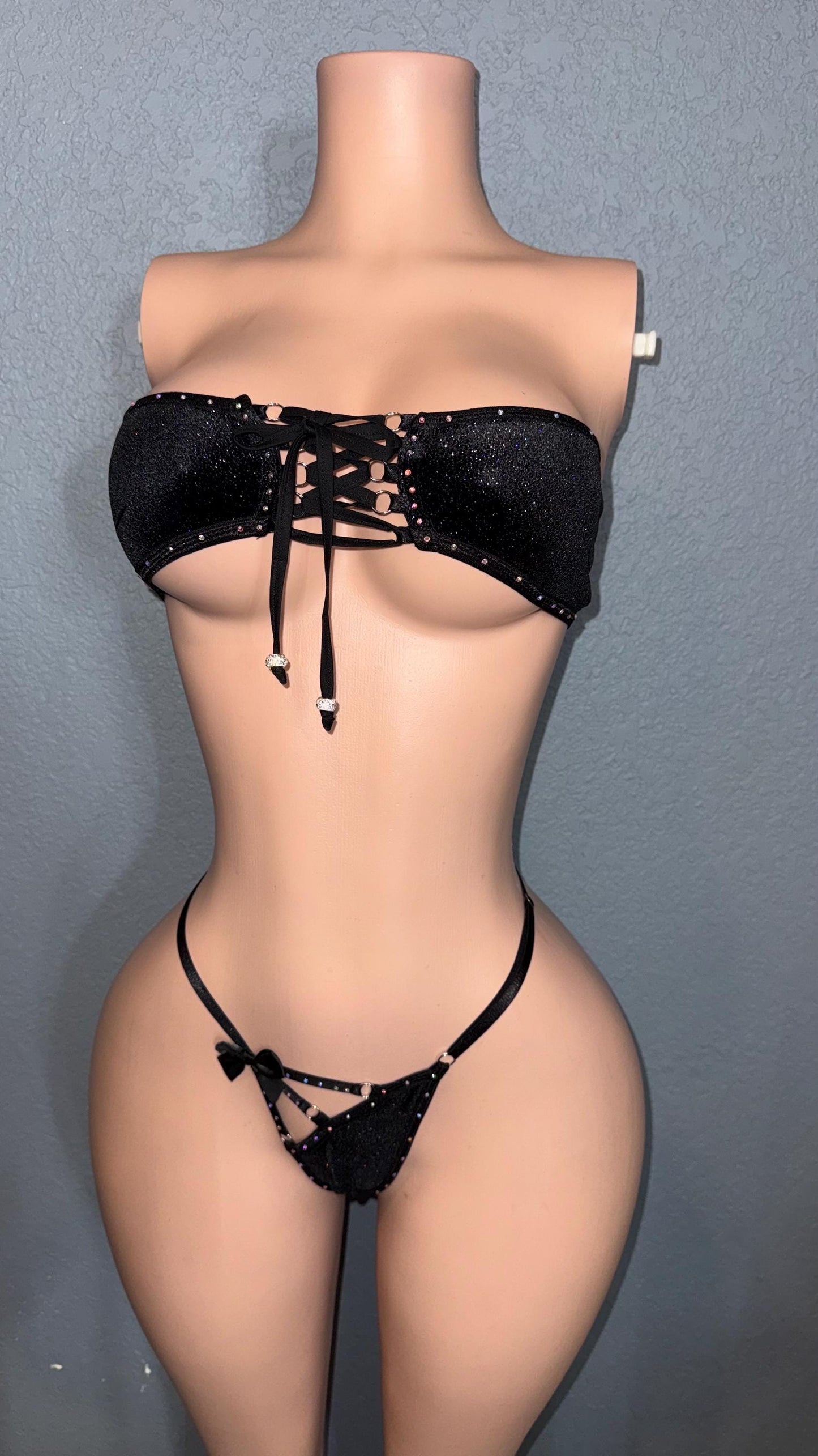 Black stretch velvet sparkly thong bikini. Adjustable with side ties.