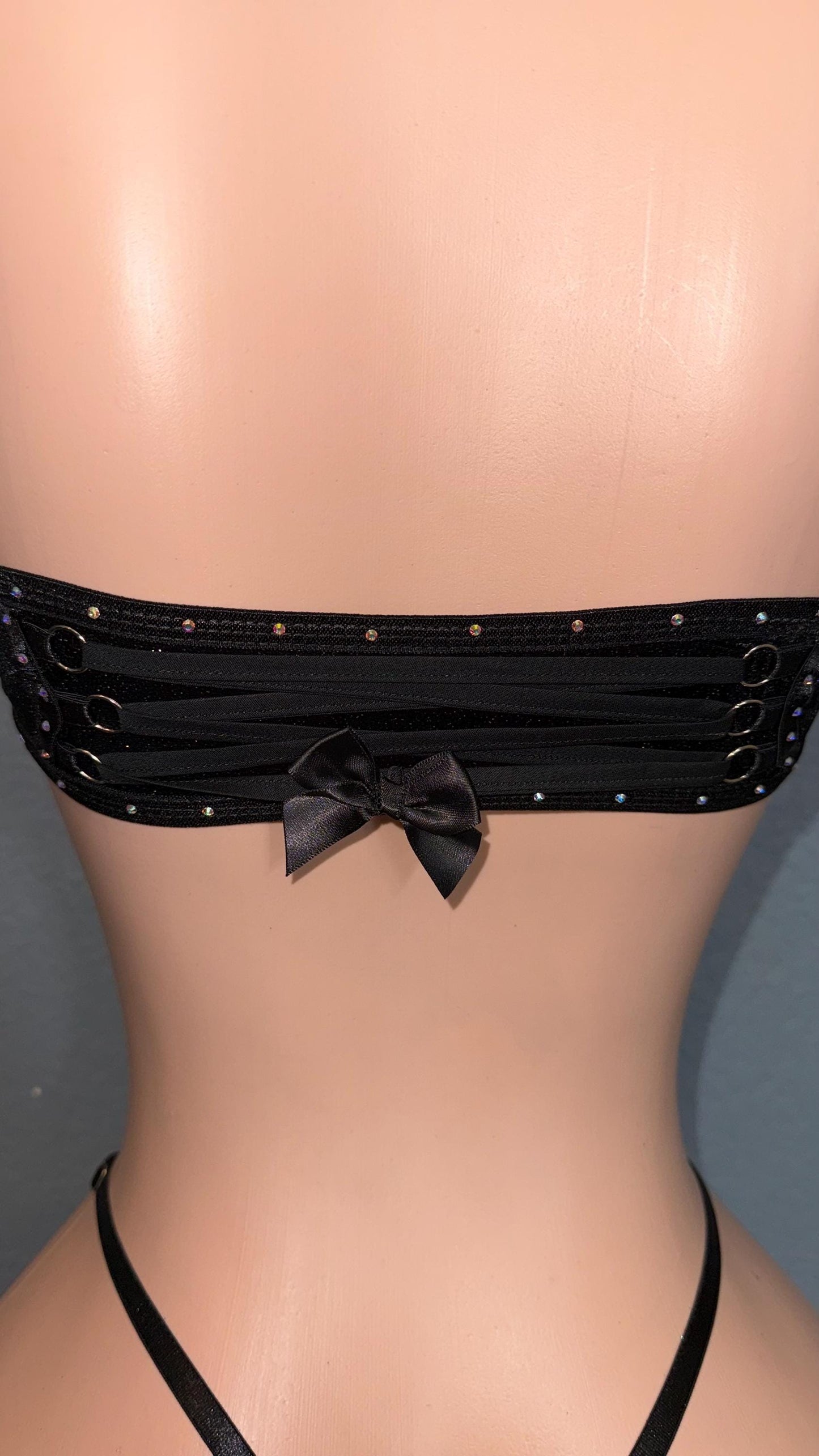 Black stretch velvet sparkly thong bikini. Adjustable with side ties.