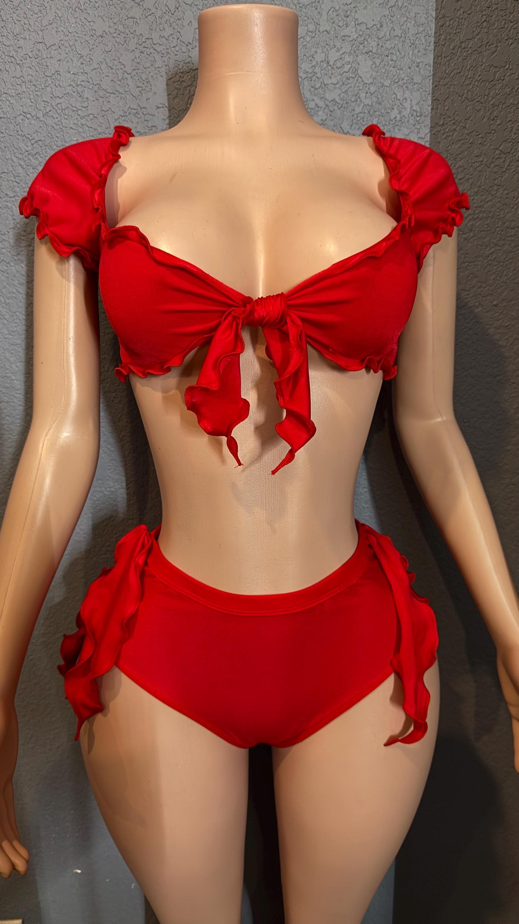 Red ruffle rave set with cheeky bottoms and attached side ties