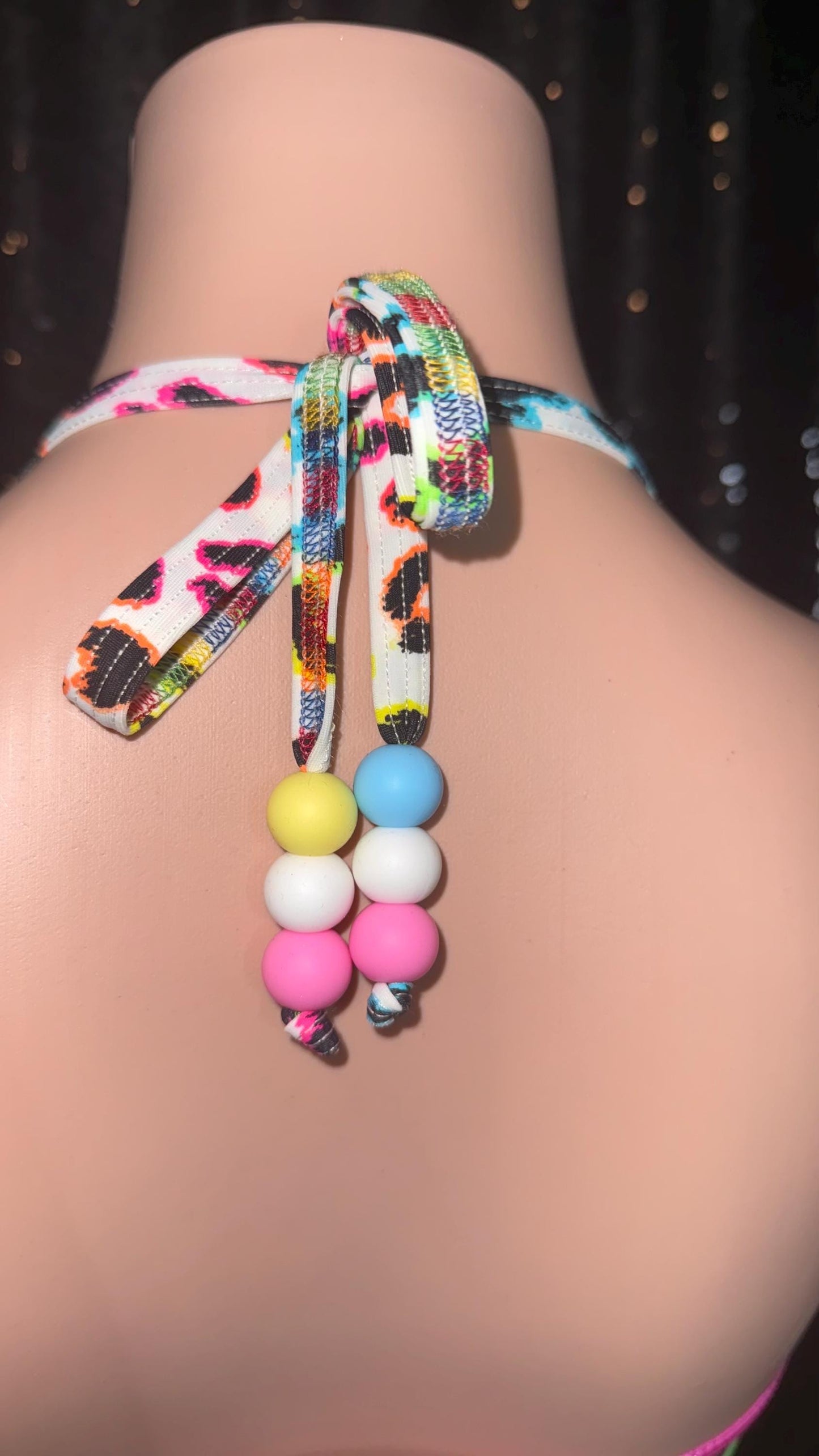 Lisa Frank inspired color blocked rave bikini with furry Pom Poms