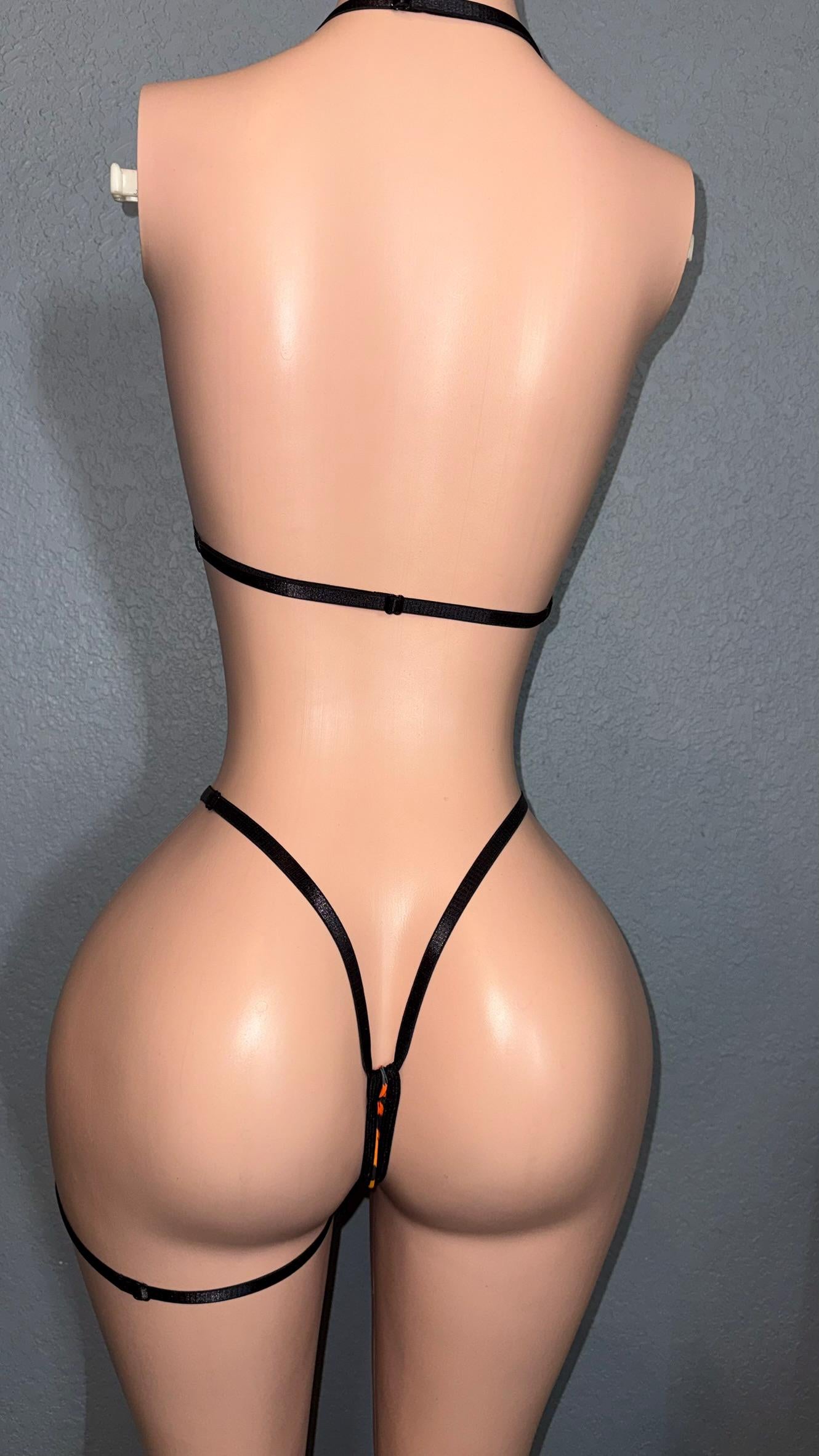 Bright Orange Tiger Bikini set with triangle top and thong, adjustable straps and matching garter.