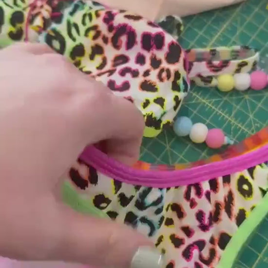 Lisa Frank inspired color blocked rave bikini with furry Pom Poms