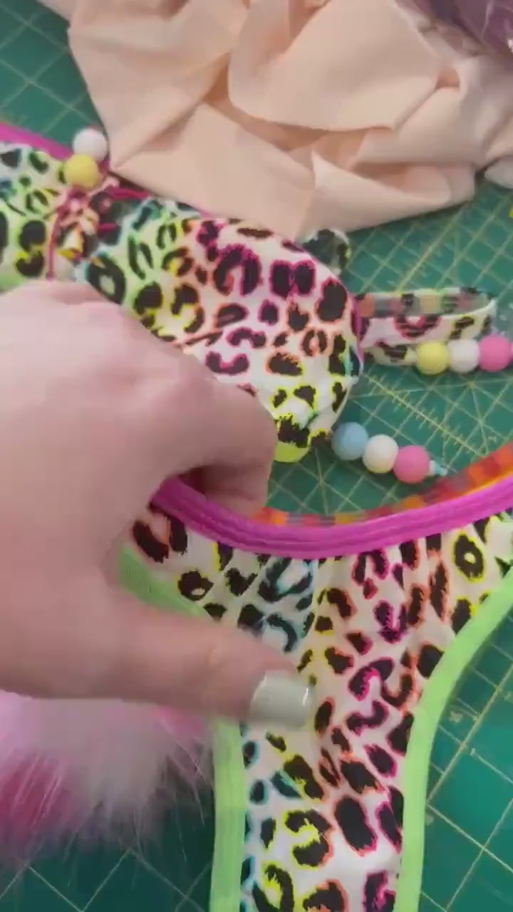 Lisa Frank inspired color blocked rave bikini with furry Pom Poms